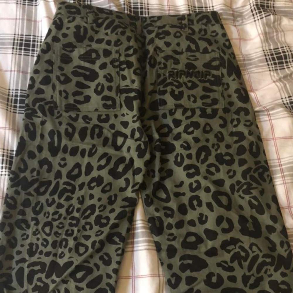 Rip n dip size 30 leopard print pants.